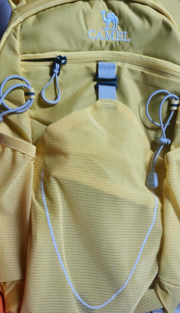 Camel Yellow Lightweight Hiking Backpack (Category: Backpacks) located in Manila. Submitted by honey010 (Listing ID 1464436647, Image 2). Description: - Lightweight and foldable Yellow Camel backpack - Multiple pockets for organization - Mesh side pouches for water bottles or essentials - Ideal for day trips, travel, hiking, and casual use - Easily packs away when not in use.