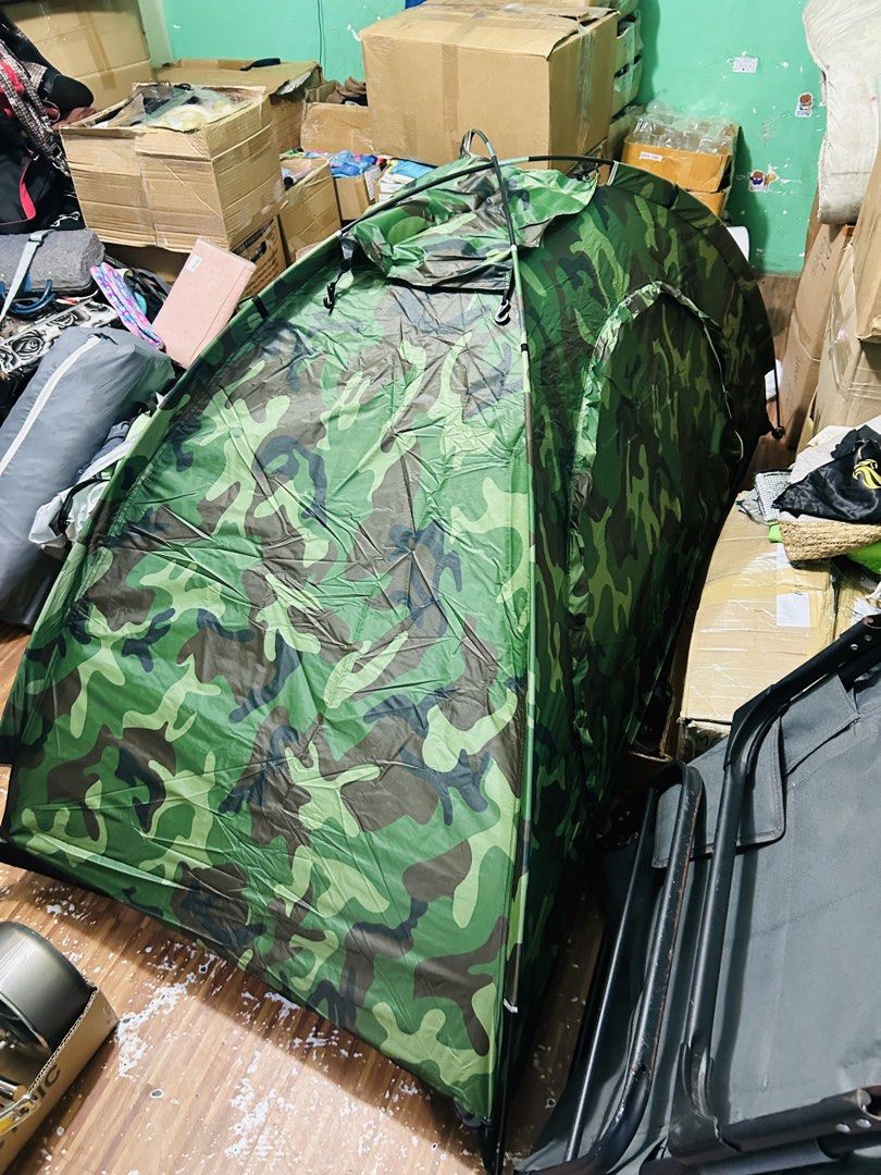 Camouflage Camping Tent Single (Category: Hiking & Camping) located in Manila. Submitted by starbalesukandjapansurplus (Listing ID 1464406004, Image 1). Description: - Green camouflage design - Simple and quick setup - Mesh windows for excellent ventilation - Perfect for camping and outdoor adventures - Folds compactly for easy storage - Made with durable materials.