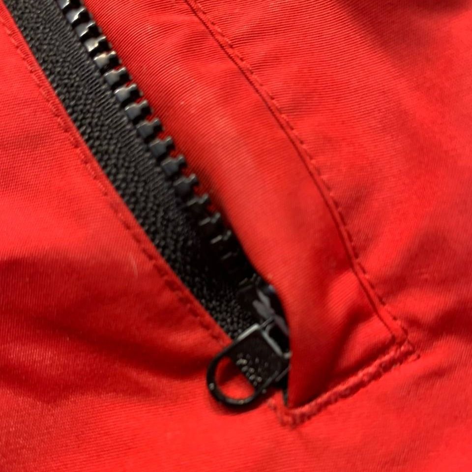 Carhartt Red Bomber Jacket (Category: Coats, Jackets and Outerwear) located in Mandaluyong City. Submitted by theroom501 (Listing ID 1464550624, Image 3). Description: Carhartt Red Bomber Jacket Style Code: Workwear Jacket Size on Tag: Small Color: Red/ Black Condition: Good pre-owned condition. The jacket shows signs of previous use, with visible creasing and wrinkles throughout the fabric. Flaws/Issues: The zipper pull tab is damaged/torn. Flat