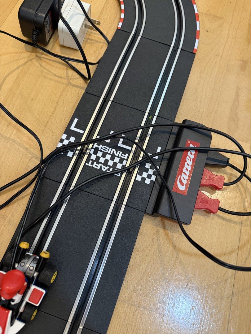 Carrera Go Mariokart racing set (Category: Kids Toys) located in Makati City. Submitted by nmvs1 (Listing ID 1464418721, Image 3). Description: Mariokart carrera Go racing track set With 2 controls, Mario and Luigi Working well Inclusions As seen in the photo only Bought for 4k.