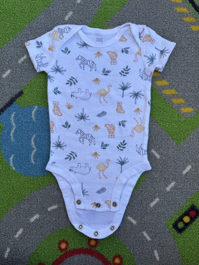 Carter’s Animal Print Onesie (Category: Babies & Kids Fashion) located in Rizal. Submitted by preloovved (Listing ID 1464390498, Image 1). Description: Cute white baby onesie with a fun jungle animal print (zebras, tigers, flamingos, hippos). Short sleeves, easy snap closures. Soft and comfy for everyday wear. Safari animal print baby onesie. Short sleeves, snap closures. Soft and comfy. Preloved, 3mos Meet-up only in GB1 San Mateo, Rizal Shippin
