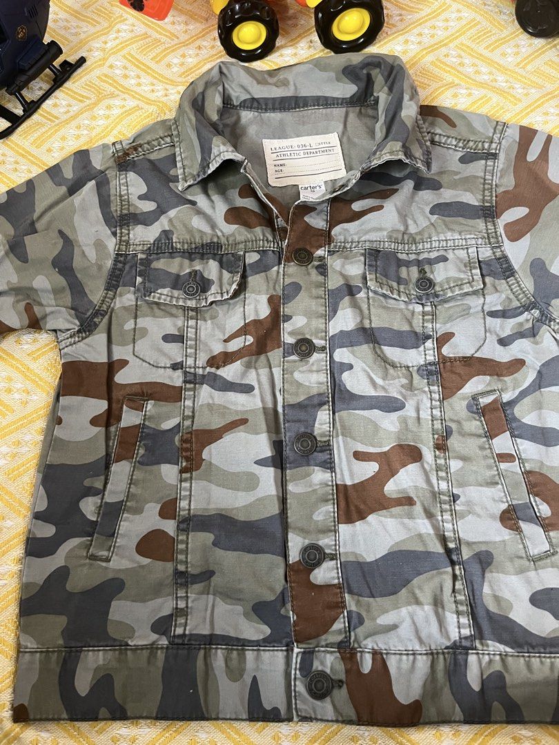 Carter's Camouflage Denim Jacket Size 8 (Category: Babies & Kids Fashion) located in Las Pinas. Submitted by fechai (Listing ID 1464425938, Image 3). Description: - Carter's camouflage denim jacket - Athletic Department style - Button-up front with chest pockets - Perfect for everyday wear - Size 8.