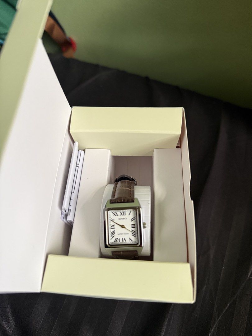 Casio Analog Watch with Leather Strap (Category: Women's Watches) located in Manila. Submitted by abisysabel15677 (Listing ID 1464365632, Image 2). Description: - Classic Casio watch - Square face with Roman numerals - Brown faux leather strap - Water resistant - Includes original box and warranty card - Purchased on 8-19-26 - Great for everyday wear .