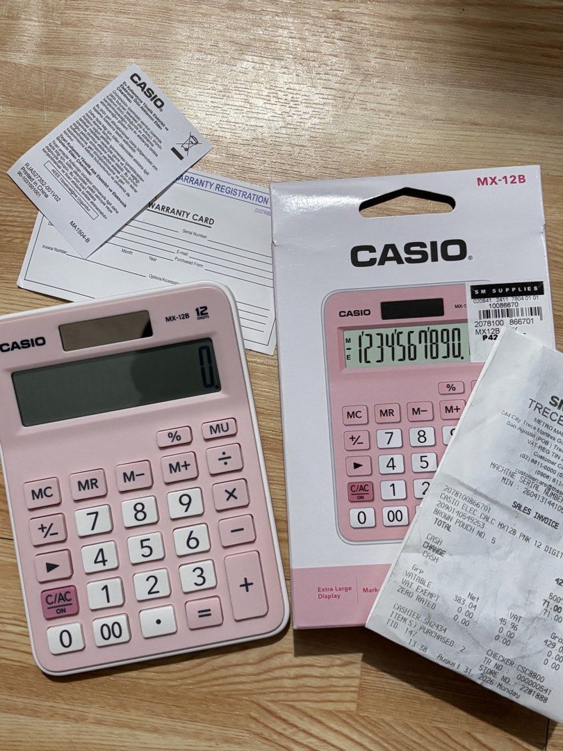 Casio MX-12B Pink Desktop Calculator (Category: Office & Business Technology) located in Manila. Submitted by lilphum (Listing ID 1464470205, Image 3). Description: FS / SWAP: Casio MX-12B Pink Calculator Price: ₱399 (Negotiable) Condition: Like new, super smooth Inclusions: Complete with box, manual, and SM receipt (100% legit). RFS: Upgrade or swap to Casio JF-120FM. Willing to add cash for swap..