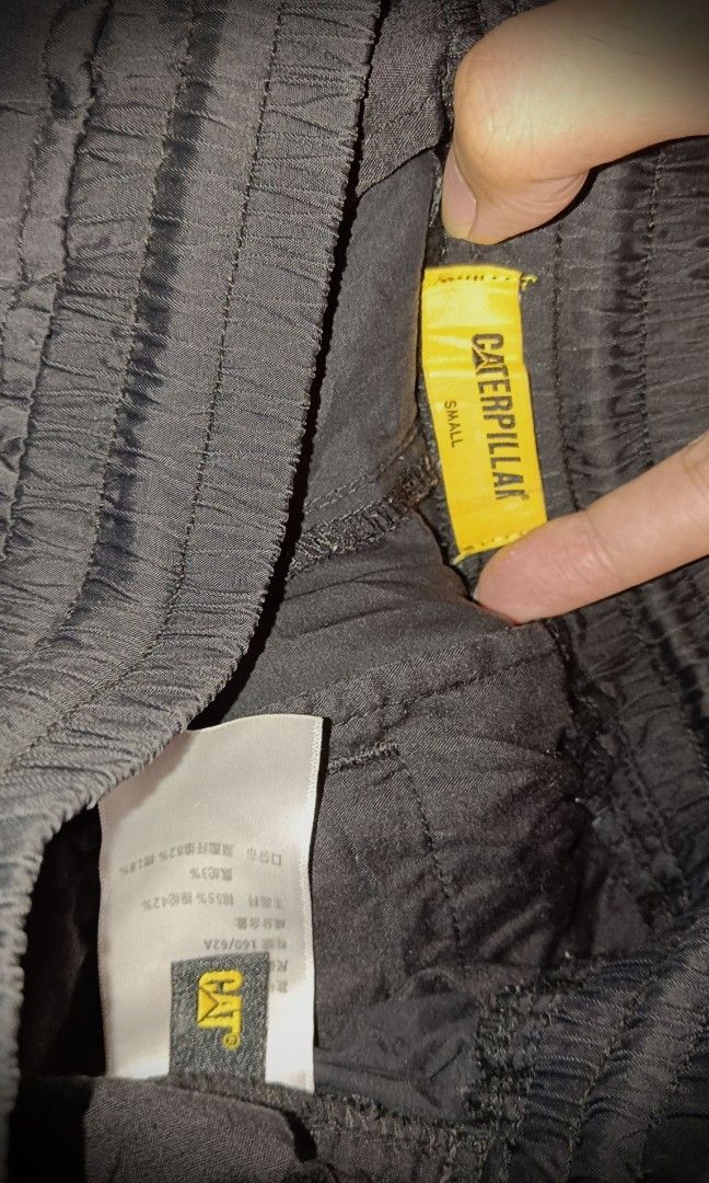 CATerpillar Multi-zipper Cargo Pants (Category: Jeans) located in Manila. Submitted by liliaplay (Listing ID 1464363614, Image 3). Description: Authentic!! Pre-loved Imported 8 pockets water resistant windbreaker semi heavy and thick embroidered design side tape design for hiking/rider Unisex size: 27-29 hem/rise: 11.5 length: 36 No Issue! Lowered to its negotiable price!! Payment 1st shipped.