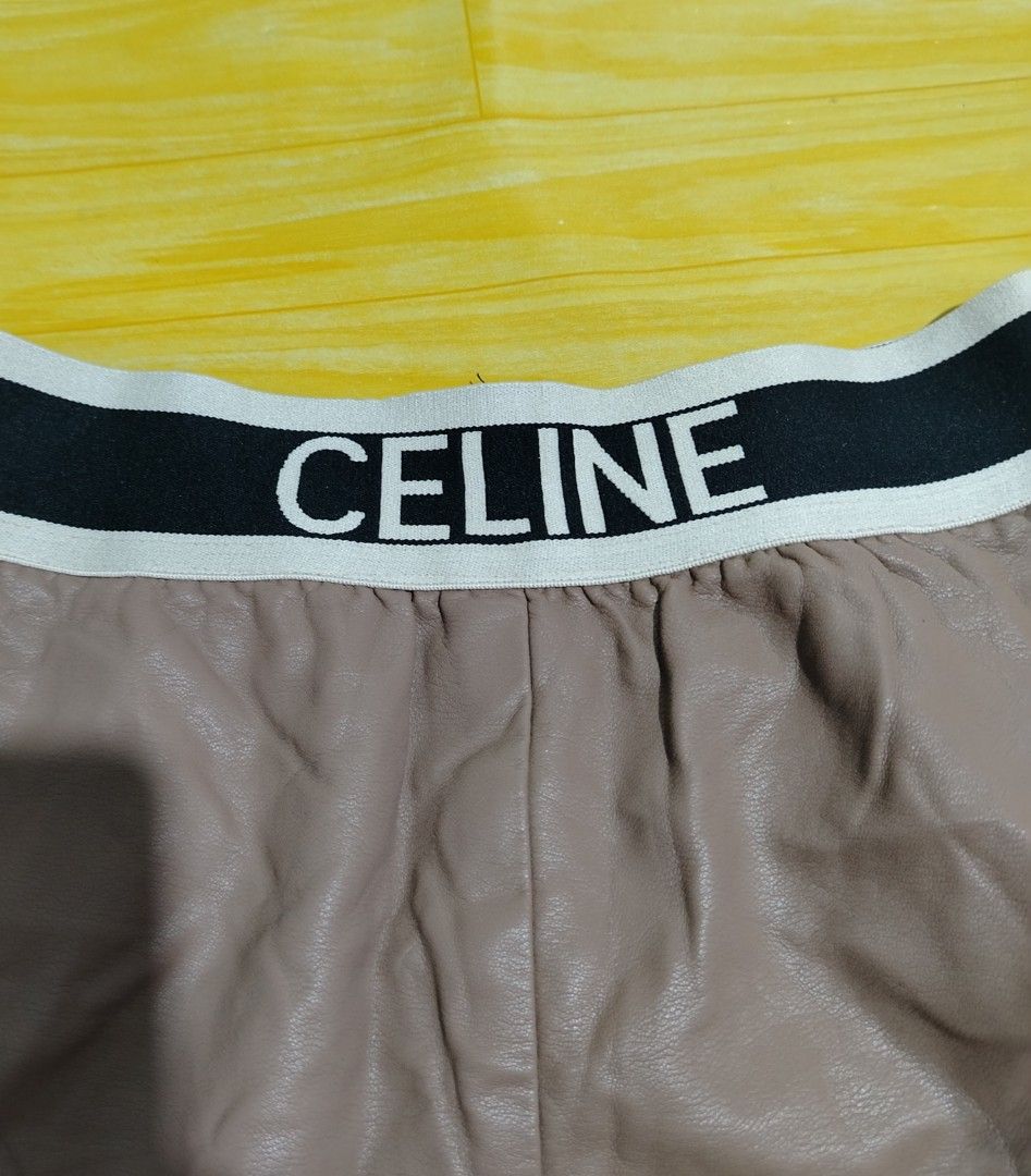 CELINE Paris Leather Shorts Size L (Category: Shorts) located in Lucena. Submitted by thrifteditem (Listing ID 1464385365, Image 2). Description: - Brand: CELINE Paris - Size: L - Made in: Italy - Material: 95% Cotton, 5% Lycra Spandex - Features: Elastic waistband with CELINE logo - Perfect for: Casual wear.