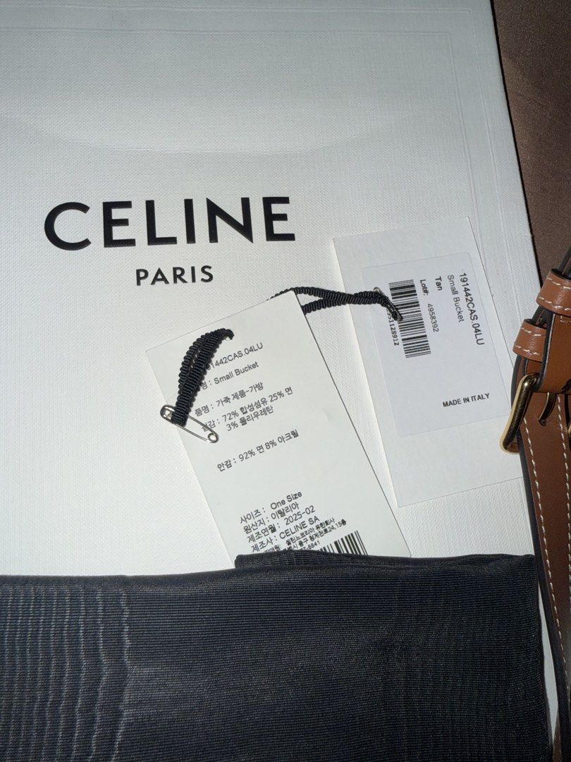 Celine Triomphe Small Bucket Bag Tan Brown (Category: Luxury Bags & Wallets) located in Paranaque City. Submitted by mnlsmrts (Listing ID 1464500392, Image 2). Description: - Authentic Celine Small Bucket Bag - Iconic Triomphe canvas in tan and brown - Made in Italy - Includes original dust bag and shopping bag - Ideal for everyday use.
