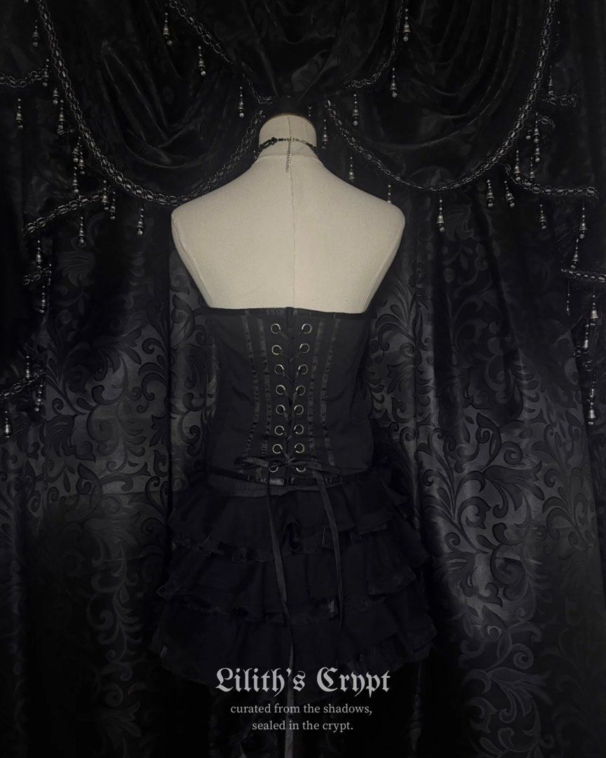 cfluk black buckled corset top | alt, goth, gothic (Category: Others Tops) located in Manila. Submitted by markedbylilith_ (Listing ID 1464535128, Image 3). Description: ┊ ┊ ┊top ✧ size : medium on tag, fits small-large ✧ bust : 34" (strapless sweetheart neckline) ✧ waist : 27-29" (cinchable with full back corset lacing) ✧ length : 15.7" ✧ flaw/s : - 𖤐 strapless front adorned with vertical satin ribbon panels and metallic hook-and-eye clasp acce