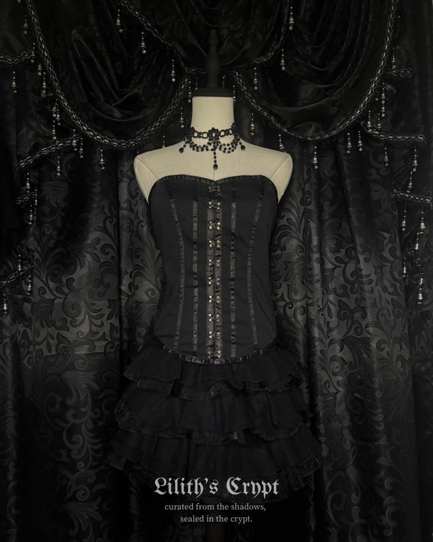 cfluk black buckled corset top | alt, goth, gothic (Category: Others Tops) located in Manila. Submitted by markedbylilith_ (Listing ID 1464535128, Image 1). Description: ┊ ┊ ┊top ✧ size : medium on tag, fits small-large ✧ bust : 34" (strapless sweetheart neckline) ✧ waist : 27-29" (cinchable with full back corset lacing) ✧ length : 15.7" ✧ flaw/s : - 𖤐 strapless front adorned with vertical satin ribbon panels and metallic hook-and-eye clasp acce