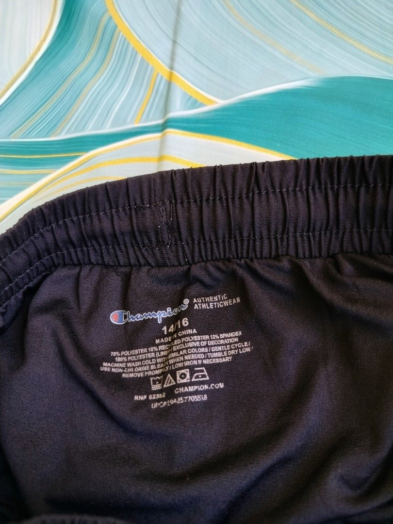 Champion Black Athletic Shorts Size 14/16 (Category: Activewear) located in Manila. Submitted by virgiliosa38485 (Listing ID 1464498006, Image 3). Description: - Brand: Champion - Color: Black -Waist 26-34 - Style: Athletic shorts - Features: Elastic waistband with drawstring - Comfort: Simple and comfortable - Use: Great for sports or lounging - Size: 14/16 - Origin: Made in China.