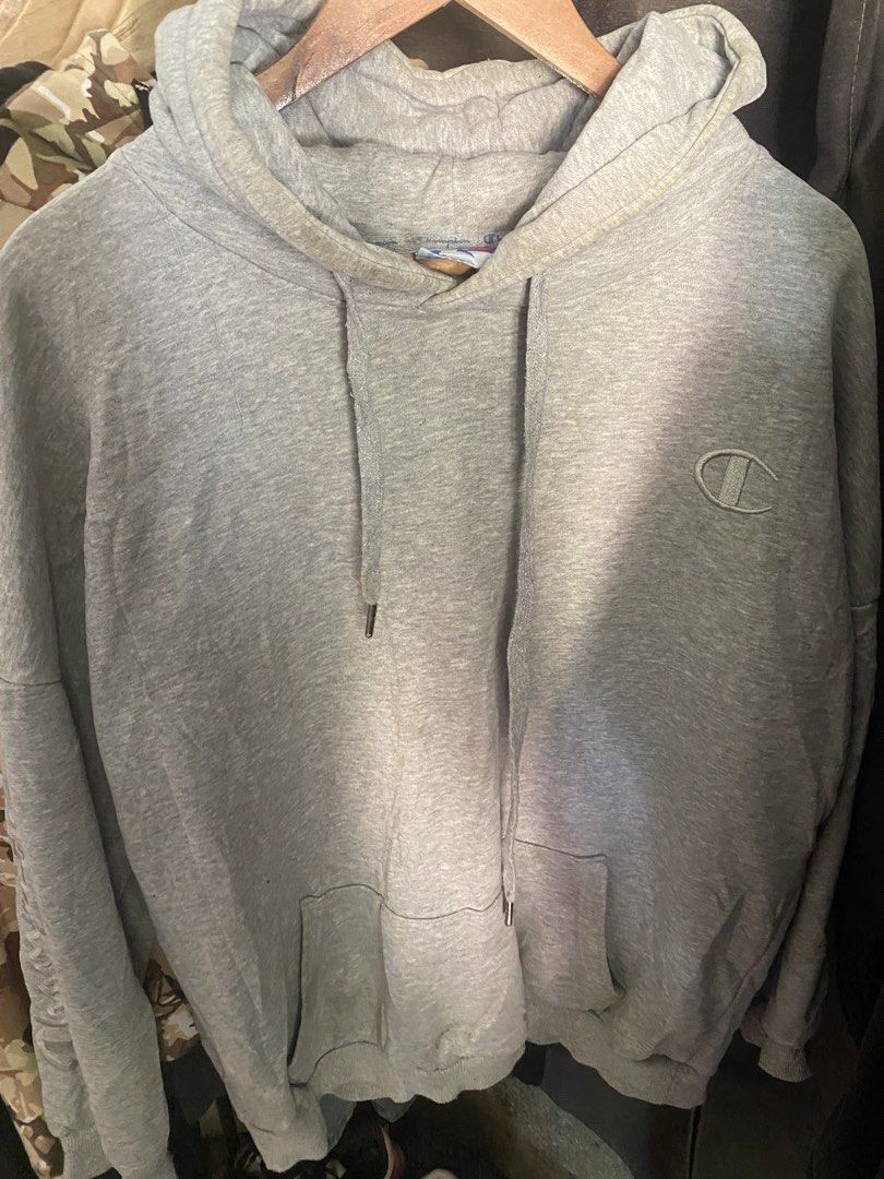 Champion Grey Hoodie (Category: Hoodies) located in Manila. Submitted by jrofit (Listing ID 1464391022, Image 1). Description: - Classic grey Champion hoodie - Features iconic embroidered logo on the chest - Convenient front kangaroo pocket - Adjustable drawstrings for the hood - Comfortable and casual, ideal for everyday wear.