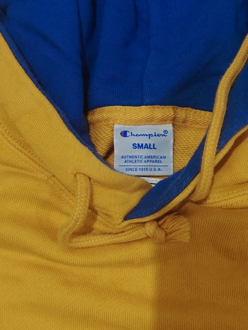 Champion Hoodie Yellow Blue Small (Category: Coats, Jackets and Outerwear) located in Manila. Submitted by fastdog_377a40 (Listing ID 1464567251, Image 2). Description: - Champion Hoodie - Color: Yellow with Blue Lining - Size: Small - Features: Classic Champion logo on chest, kangaroo pocket, drawstring hood - Ideal for: Casual wear.
