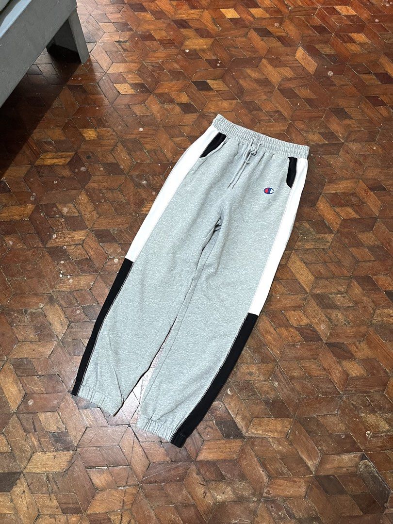Champion sweat pants (Category: Joggers) located in Manila. Submitted by oloip.thrift (Listing ID 1464396040, Image 2). Description: Size: L on tag Dimes: 24/37 (adjustable waist) Color rate: 10/10 Excellent condition No issue .