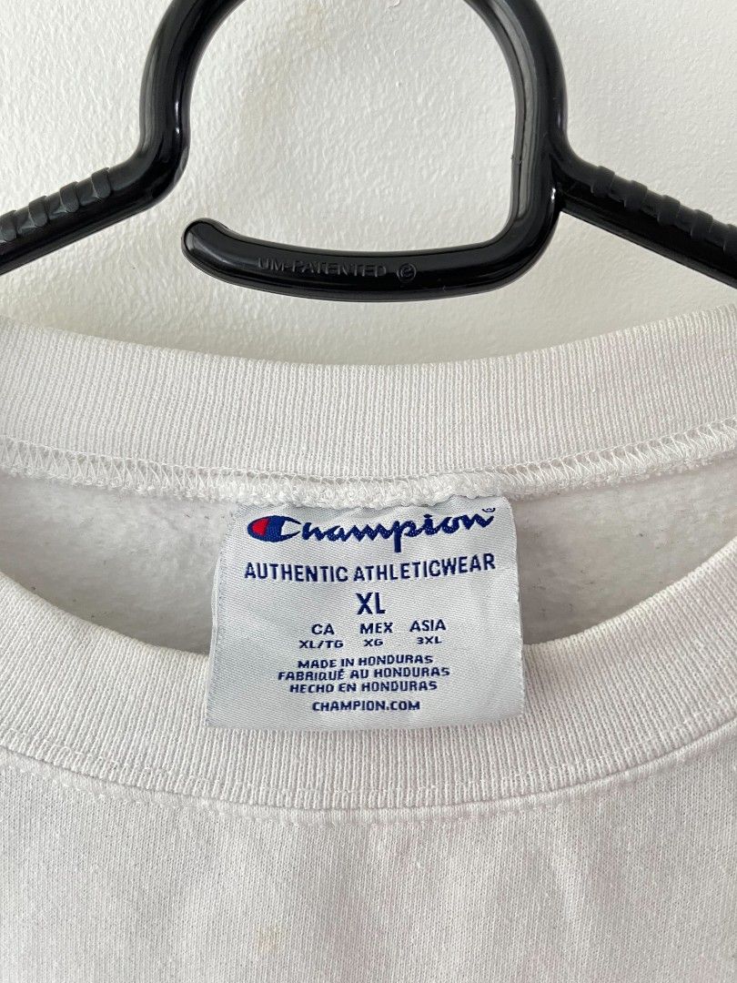 Champion Wolves University White Sweater (Category: Coats, Jackets and Outerwear) located in Quezon City. Submitted by mariaplusmoshi (Listing ID 1464524663, Image 2). Description: deets alr posted 📍EVER, COMMONWEALTH, Q.C MOP: GCASH LALAMOVE/J&T.
