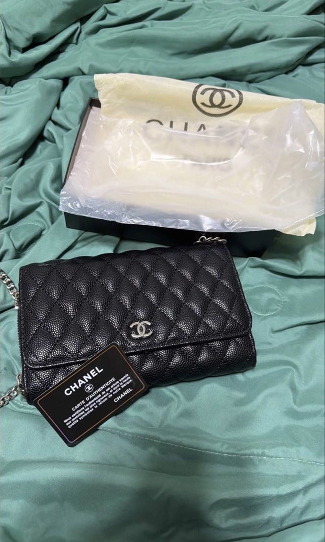 Chanel Black Quilted Caviar Wallet on Chain (Category: Luxury Bags & Wallets) located in Malabon City. Submitted by ilovecallas (Listing ID 1464475706, Image 1). Description: - Authentic Chanel WOC - Black caviar leather - Quilted design - Silver hardware - Includes authenticity card, dust bag, and box - Ideal for carrying essentials - FREE POPMART CRYBABY KEYCHAIN.