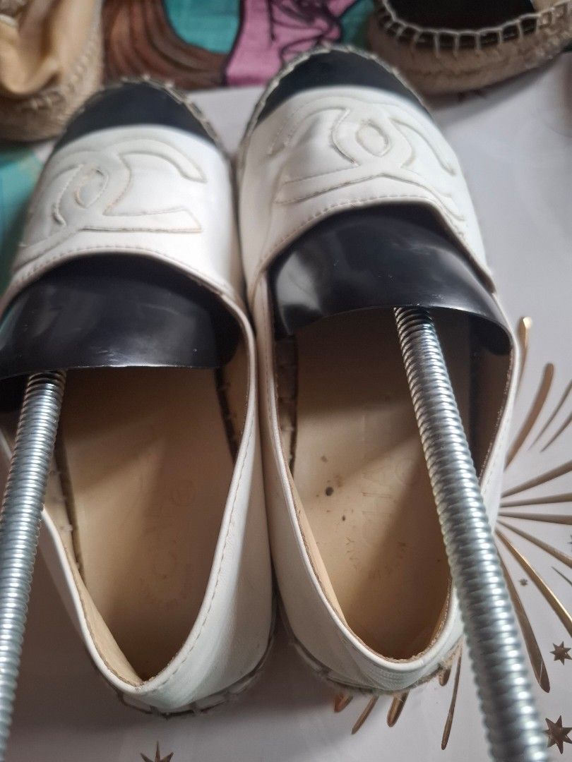 Chanel Espadrilles Flats Shoes (Category: Flats & Sandals) located in Marikina City. Submitted by bags21.ph (Listing ID 1464438883, Image 3). Description: - Classic Chanel espadrilles - Black and white leather - Signature CC logo detail - Jute trim around the sole - Comfortable slip-on style - Versatile for casual or dressed-up looks.