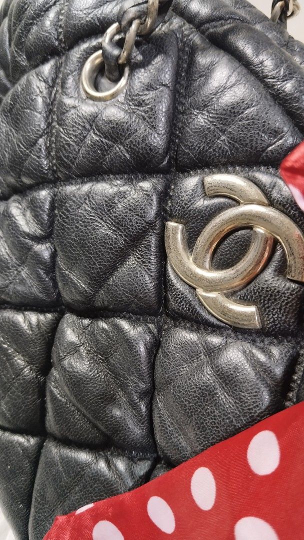Chanel Lambskin Bubble Quilt Bowler Black (Category: Luxury Bags & Wallets) located in Manila. Submitted by mudrascloset.ph (Listing ID 1464402096, Image 2). Description: - vintage Chanel black quilted leather shoulder bag - Features iconic silver CC logo - Silver chain leather strap for comfortable wear - Secure zipper closure - Interior "Made in Italy" label - ykk zipper * height - 8 in width - 6 in base length - 13 in drop - 9.5 in - Ideal for
