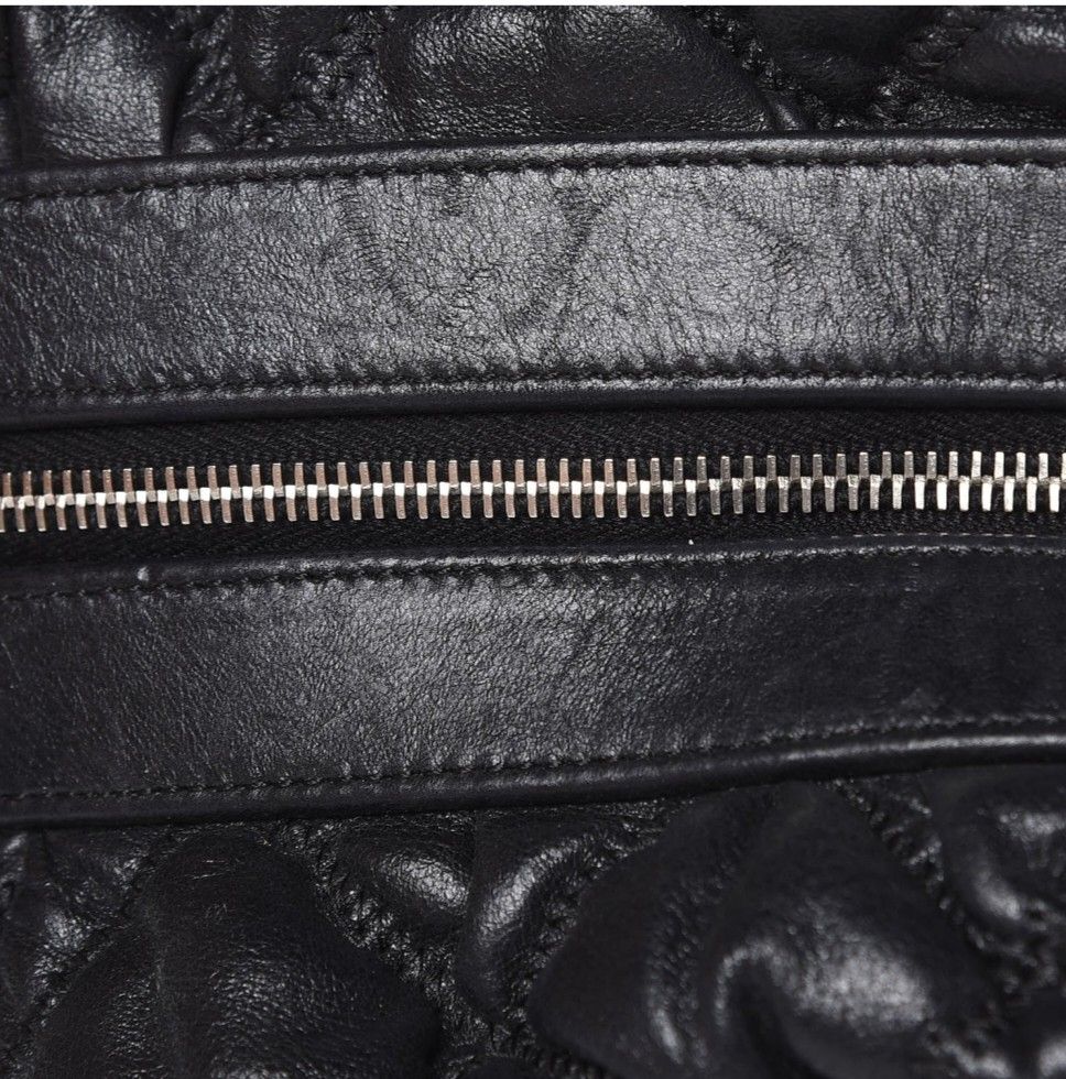 Chanel Lambskin Bubble Quilt Bowler Black (Category: Luxury Bags & Wallets) located in Manila. Submitted by mudrascloset.ph (Listing ID 1464402096, Image 3). Description: - vintage Chanel black quilted leather shoulder bag - Features iconic silver CC logo - Silver chain leather strap for comfortable wear - Secure zipper closure - Interior "Made in Italy" label - ykk zipper * height - 8 in width - 6 in base length - 13 in drop - 9.5 in - Ideal for