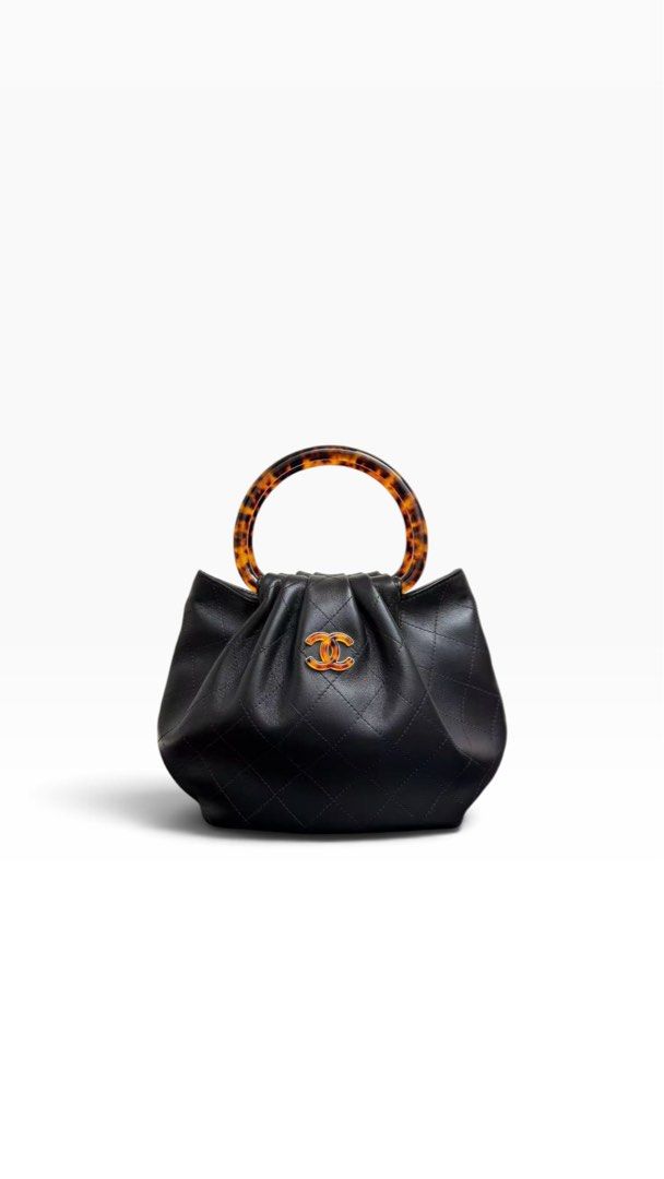Chanel Plexiglass Tortoise Shell Quilted Pouch (Category: Luxury Bags & Wallets) located in Manila. Submitted by designerarchives.ph (Listing ID 1464419117, Image 2). Description: Actual photos are uploaded. I just removed the background. Bags are not onhand. 50% dp is required. NGA. Buy at your own risk. .