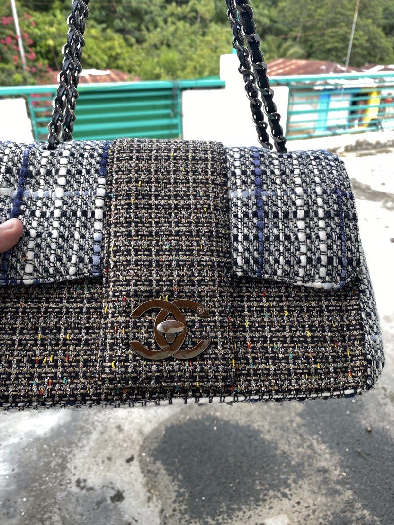 Chanel Tweed Flap Bag with Chain Strap (Category: Luxury Bags & Wallets) located in Lucena. Submitted by handpickthrift (Listing ID 1464401271, Image 2). Description: - Classic Chanel flap bag - Tweed exterior - Black leather interior - Silver-toned hardware - Chain strap with leather and metal accents - Interior zippered pocket - Interior slip pocket - Versatile for day or night use.
