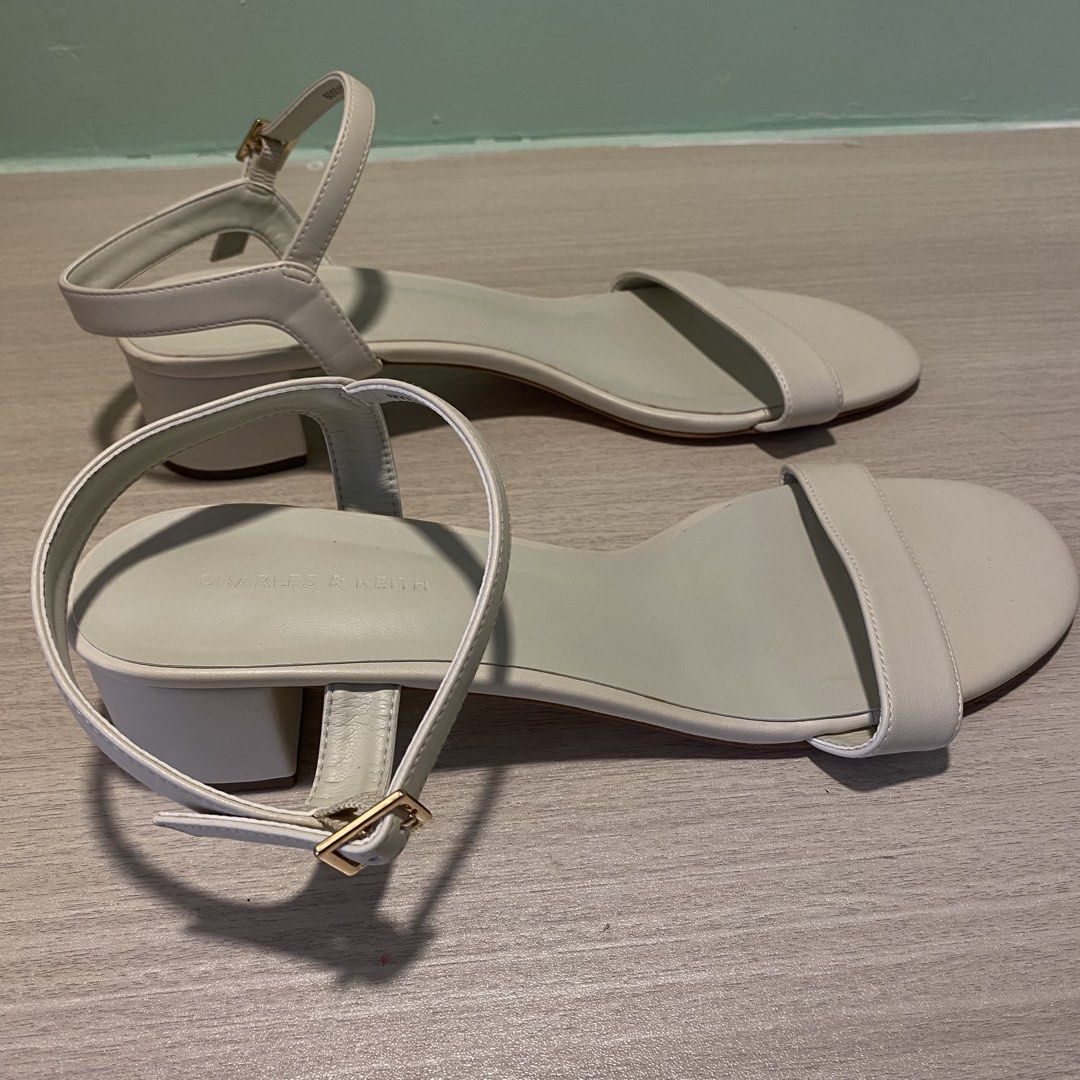 Charles & Keith Block-Heel Sandals (Category: Flats & Sandals) located in Muntinlupa City. Submitted by ryuzjyn (Listing ID 1464384506, Image 2). Description: Brand: Charles & Keith Color: White Style: Ankle-Strap Sandals Heel Type: Block Heel Comfortable heel height for everyday wear and pairs well with various outfits (casual/formal).