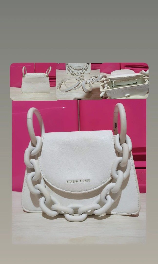 Charles & Keith Chunky Chain Link Bag (Category: Luxury Bags & Wallets) located in Paete. Submitted by xiaochao.16 (Listing ID 1464361194, Image 1). Description: Two-Way, can be a Kili or Shoulder bag w/ 2 extra sling strap.