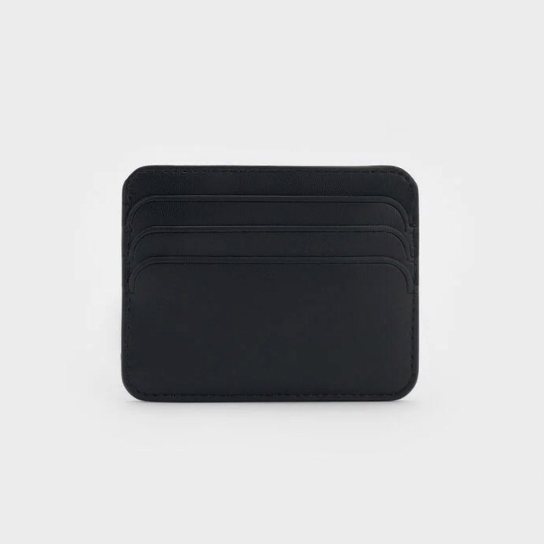 CHARLES & KEITH Cleo Two-Tone Quilted Card Holder (Category: Wallets & Card holders) located in Santa Rosa. Submitted by sha.mnl (Listing ID 1464422530, Image 2). Description: — Inclusions: Card Holder, Dust Bag & Box — Color: Midnight Black — Size: XXS — 6 Card Slots w/ Middle Compartment.