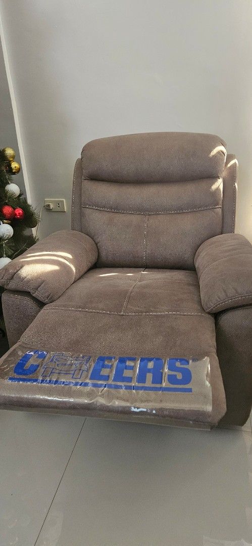 CHEERS Recliner Armchair - Comfortable Single Seater (Category: Chairs) located in Paombong. Submitted by jaysonsuma36660 (Listing ID 1464417607, Image 2). Description: - Single seater recliner armchair - Upholstered in soft, textured fabric - Padded headrest and armrests for extra comfort - Easy adjustment recliner mechanism - Ideal for relaxing in your living room.