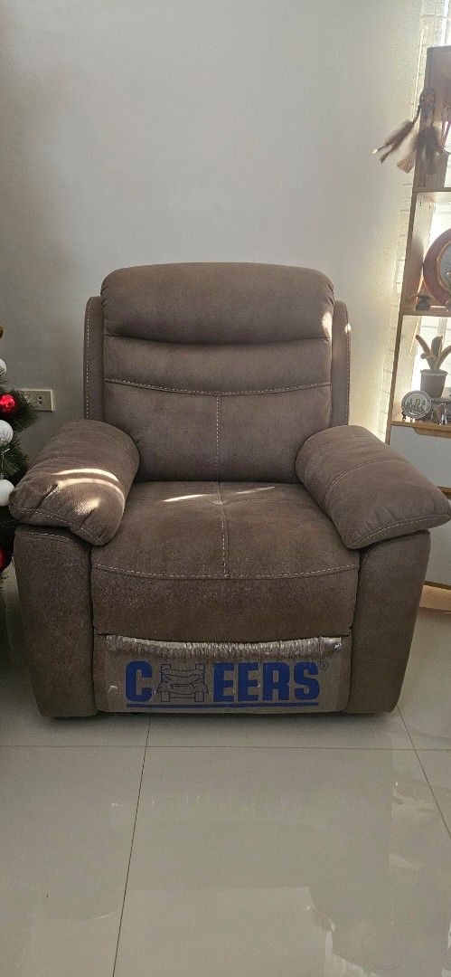 CHEERS Recliner Armchair - Comfortable Single Seater (Category: Chairs) located in Paombong. Submitted by jaysonsuma36660 (Listing ID 1464417607, Image 1). Description: - Single seater recliner armchair - Upholstered in soft, textured fabric - Padded headrest and armrests for extra comfort - Easy adjustment recliner mechanism - Ideal for relaxing in your living room.