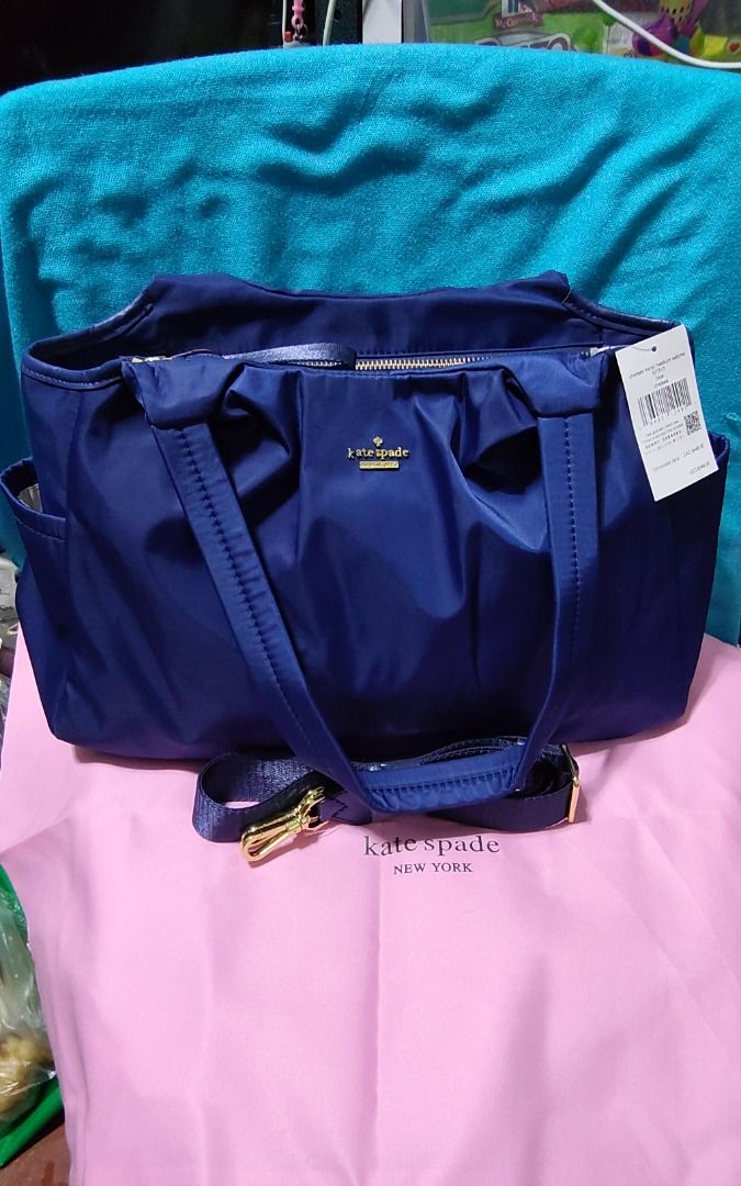 Chelsea KSNY Medium Satchel Blue (Category: Tote Bags) located in Caloocan City. Submitted by jpmshoppe (Listing ID 1464450480, Image 1). Description: - Brand: Kate Spade New York - Model: Chelsea KSNY Medium Satchel - Color: Blue - Material: Nylon - Closure: Zip - Interior: Pockets - Includes: Original tag, Dust bag - Value: Comparable value listed on tag.