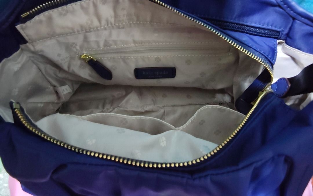 Chelsea KSNY Medium Satchel Blue (Category: Tote Bags) located in Caloocan City. Submitted by jpmshoppe (Listing ID 1464450480, Image 3). Description: - Brand: Kate Spade New York - Model: Chelsea KSNY Medium Satchel - Color: Blue - Material: Nylon - Closure: Zip - Interior: Pockets - Includes: Original tag, Dust bag - Value: Comparable value listed on tag.