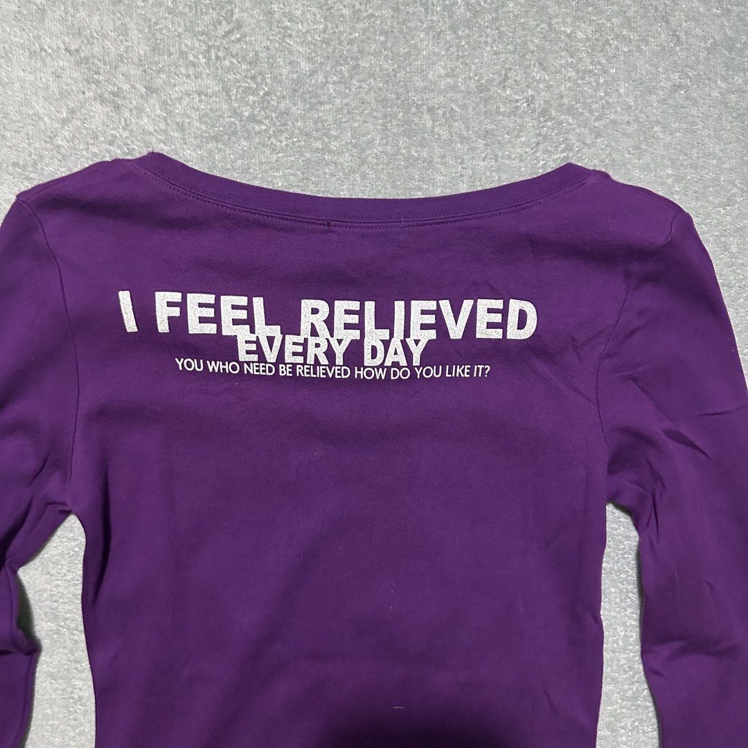 Cherry Pop Purple Graphic Long Sleeve Tee Size M (Category: Longsleeves) located in Villaverde. Submitted by bakatzy_secondhand_garments (Listing ID 1464436818, Image 2). Description: - Brand: Cherry Pop - Color: Purple - Sleeves: Long-sleeved - Size: M - Front Graphic: Text reads 'THIS IS A RELIEF NOT KNOWN among people, to our surprise JUST IMAGINE PLEASANT THINGS AND YOUR HEART WILL BE RELIEVED BEING RELIEVED WILL IMPROVE HUMAN RELATIONS' - Ba