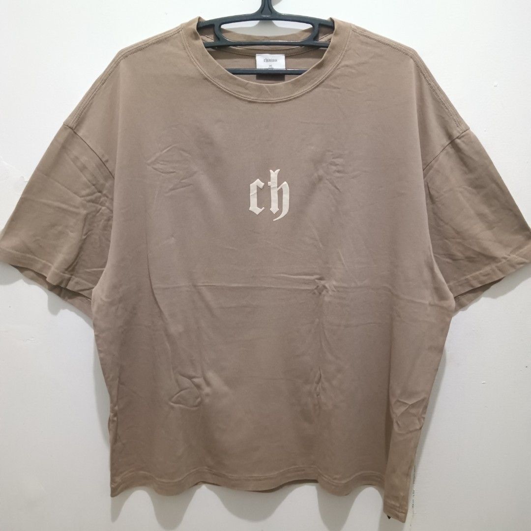 CHINISM Logo Print Shirt (Category: Tshirts & Polo Shirts ) located in Caloocan City. Submitted by jaychingsss (Listing ID 1464542050, Image 1). Description: Chinism Logo Shirt - 150 25x27 Boxy Type Complete Tags Color Rate: 9.5/10 NEED WASH.