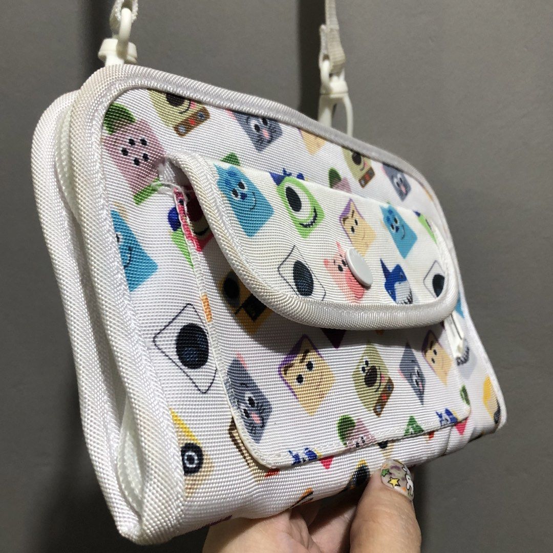 Chocoolate Disney Pixar Wallet Organizer Sling Bag (Category: Wallets & Card holders) located in Quezon City. Submitted by kitsune.treasures (Listing ID 1464452331, Image 2). Description: Needs laba lang. Excellent condition. *First to pay policy! *1 day reservation only. Failure to pay on time, auto cancel. 📍Quezon City * MOD: J&T | Lalamove * MOP: GCASH | BPI 📦ON HAND AND READY TO SHIP! CONDITION: WHAT YOU SEE IS WHAT YOU GET. Dimensions: Kin