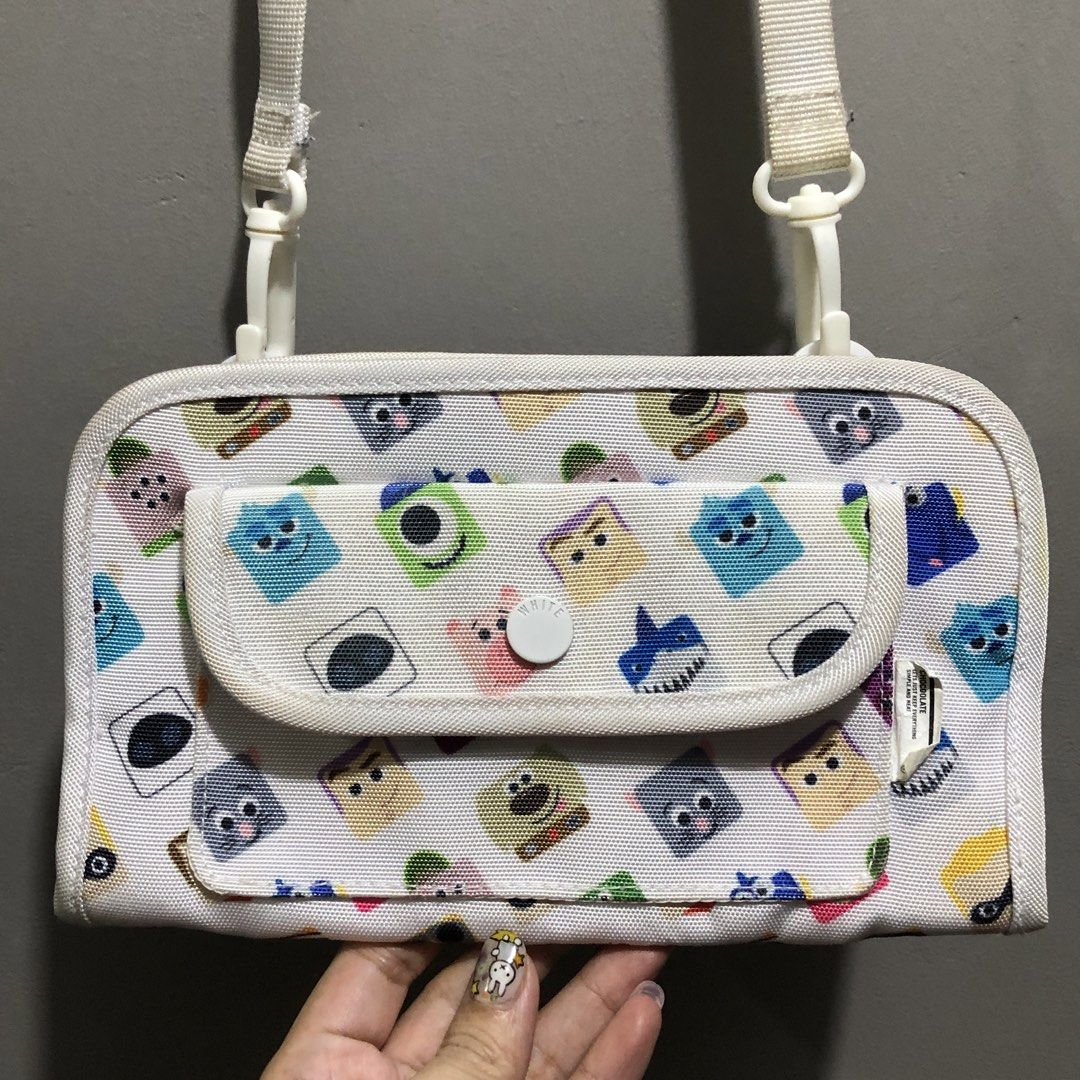 Chocoolate Disney Pixar Wallet Organizer Sling Bag (Category: Wallets & Card holders) located in Quezon City. Submitted by kitsune.treasures (Listing ID 1464452331, Image 1). Description: Needs laba lang. Excellent condition. *First to pay policy! *1 day reservation only. Failure to pay on time, auto cancel. 📍Quezon City * MOD: J&T | Lalamove * MOP: GCASH | BPI 📦ON HAND AND READY TO SHIP! CONDITION: WHAT YOU SEE IS WHAT YOU GET. Dimensions: Kin