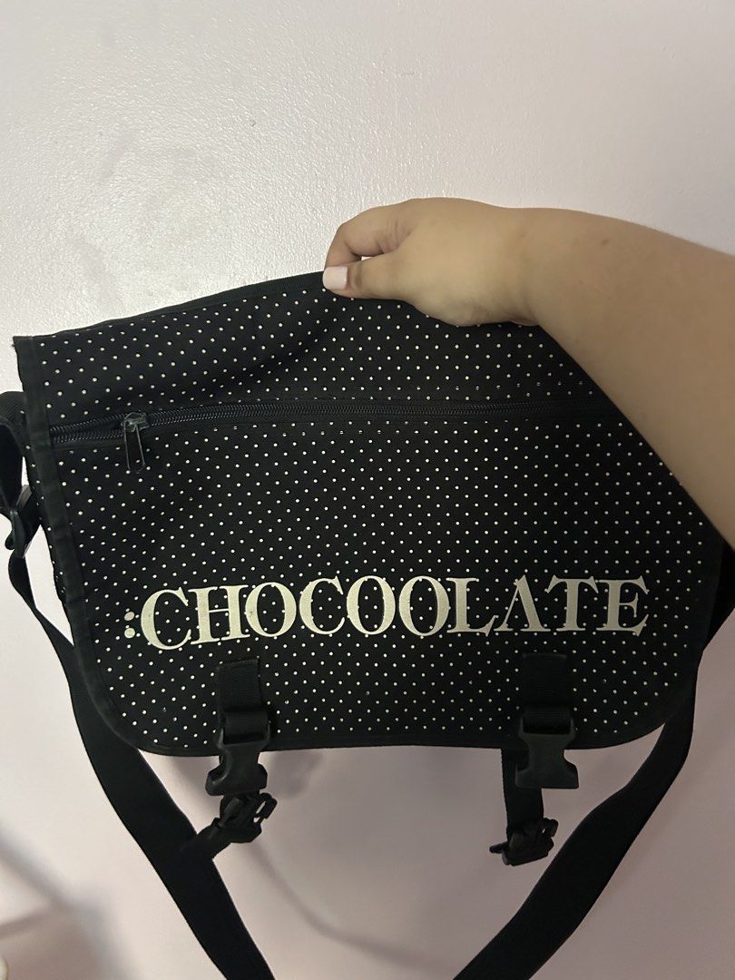 chocoolate messenger/sling bag (Category: Sling Bags) located in Pasig City. Submitted by haechanchichan (Listing ID 1464391024, Image 1). Description: -item's condition is as is on the photo posted -can fit up to 15 inch laptop.