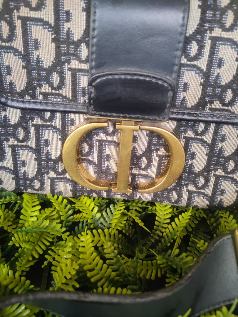 Christian Dior (Category: Shoulder Bags) located in Davao. Submitted by asherbenedict24 (Listing ID 1464480621, Image 2). Description: From korea box. Preloved Size L - 5.0 inch W - 7.0 inch with sign of used.