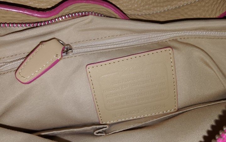 Authentic Coach Bleecker Pebbled Leather Sullivan Hobo (Category: Luxury Bags & Wallets) located in Caloocan City. Submitted by 11eleven.shop (Listing ID 1464522864, Image 2). Description: - Authentic Coach tan pebble leather hobo bag - Eye-catching bright pink interior lining and zipper trim - 2-way - Vintage Brand New (old stock released from PH factory) - Spacious main compartment for all your essentials - Very clean interior with leather cree