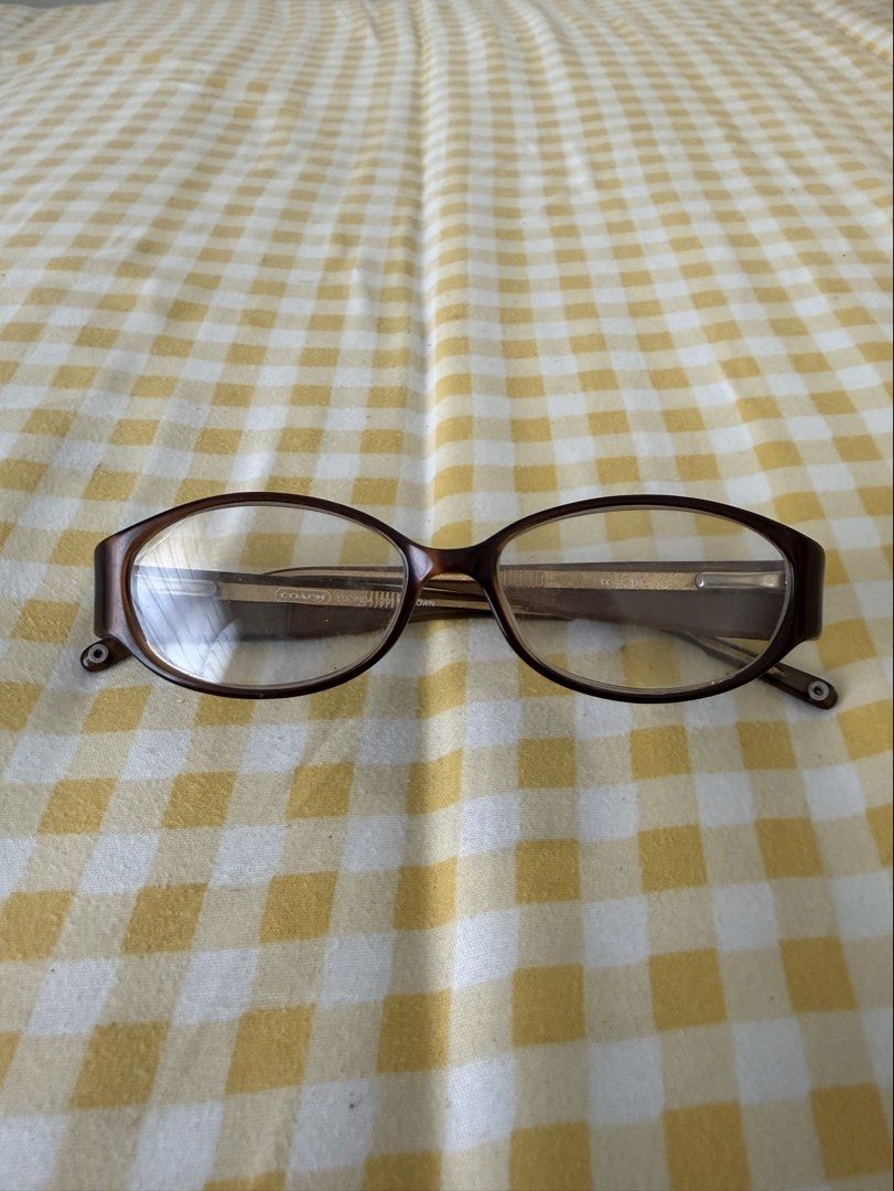 Coach Brown Eyewear (Category: Sunglasses & Eyewear) located in Manila. Submitted by znda.e (Listing ID 1464410096, Image 1). Description: - Authentic brown Coach eyeglasses frame - Coach logo on the side - Note: May grade yung lenses - I can give you a case with it - Lalamove/Jnt (Pasay) .