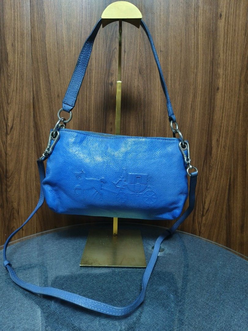 COACH Charley Two-way Bag (Category: Cross-body Bags) located in Baguio. Submitted by luxuryvaultbagsandfashion (Listing ID 1464434618, Image 2). Description: COACH CHARLEY Two-way Bag Autheaas see 1TORY BURCH MONOGRAM COATED CANVAS TOTE (BLUE) Spacious, durable, and stylish! The Tory Burch Gemini Link tote is crafted from water-resistant coated canvas featuring an eye-catching geometric chain print, central stripe, and blue leather trim. Specifi