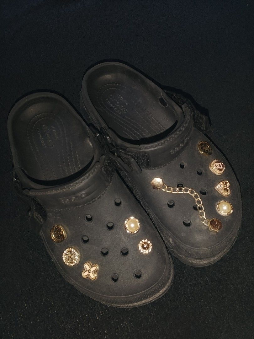 Coach Flip Flops & Embellished Crocs (Category: Slippers and slides) located in Panitan. Submitted by danieldeju29592 (Listing ID 1464406876, Image 3). Description: - Coach flip flops: Brown with signature C print, size 7. Note: some wear on straps. - Black Crocs: Decorated with charms and a chain, size 7. Perfect for casual wear..