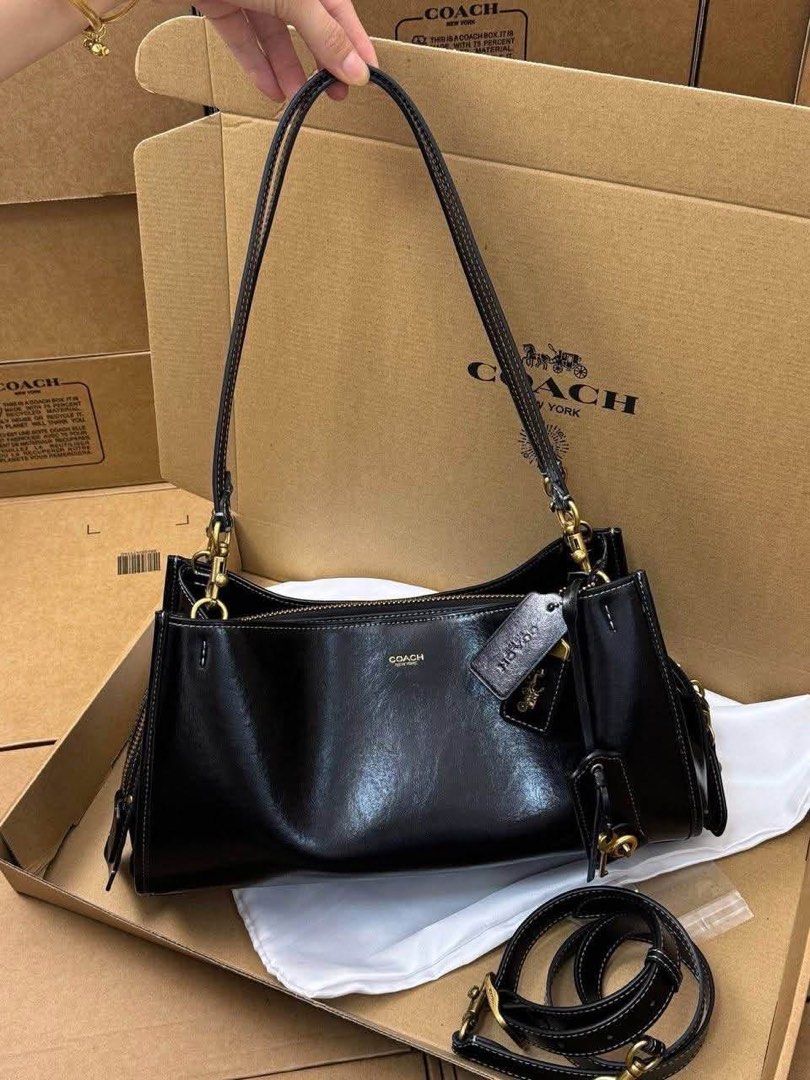 Coach Leather Shoulder Bag - Dark Brown & Black (Category: Luxury Bags & Wallets) located in Manila. Submitted by liahsells (Listing ID 1464433540, Image 2). Description: - Two authentic Coach leather shoulder bags - Available colors: Dark Brown and Black - Features classic Coach logo and hardware - Includes original dust bags and boxes - Versatile for everyday wear or special events.