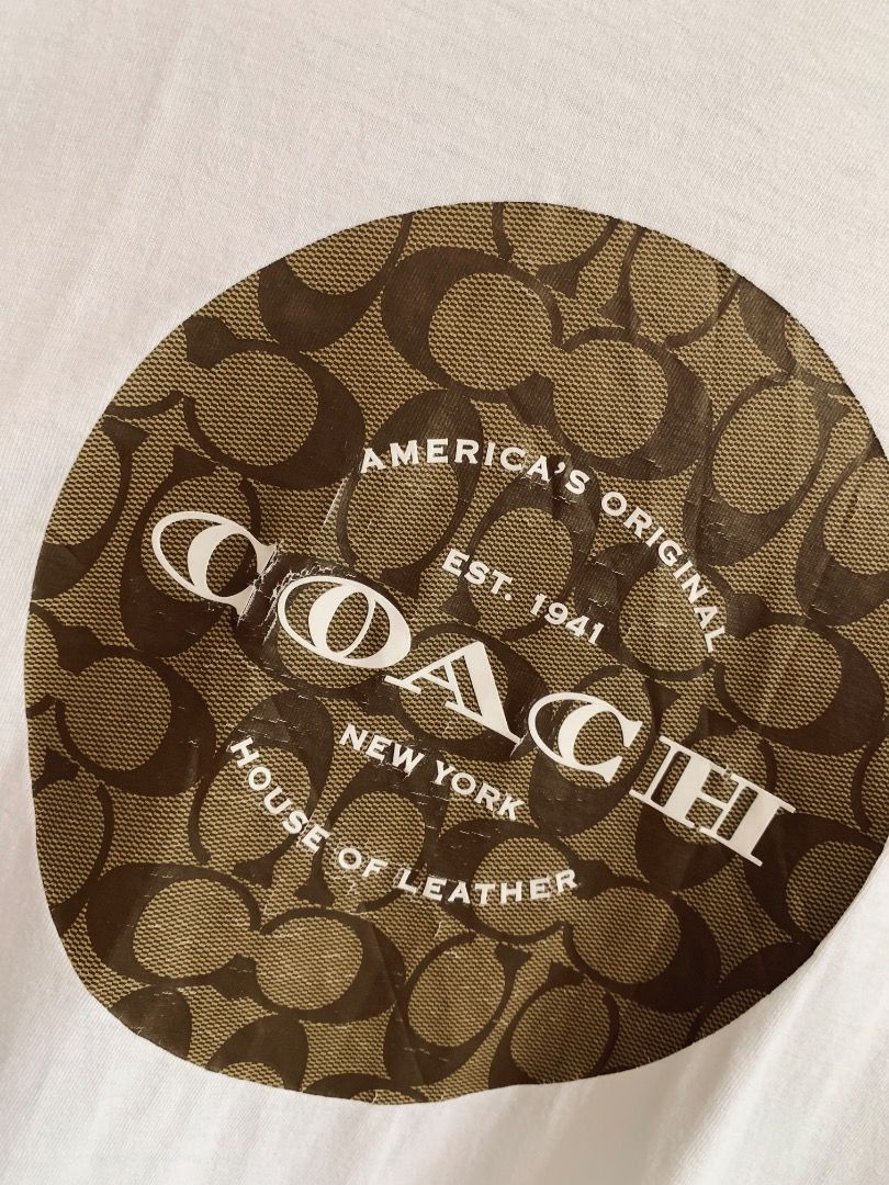 Coach Medallion Logo Shirt (Category: Tshirts & Polo Shirts ) located in Tacurong. Submitted by mwloots04 (Listing ID 1464428566, Image 3). Description: Excellent condition Issue: Hairlines 9.8/10 Colorrate Dimes: 21x29.