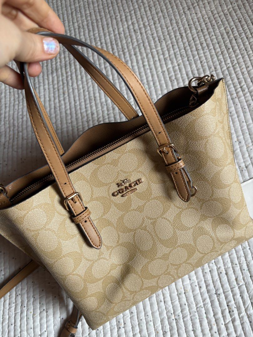 Coach Mollie (Category: Cross-body Bags) located in Pateros City. Submitted by diazmine (Listing ID 1464567409, Image 2). Description: 🎯 Read caption carefully ‼️ Selling because the hang tag was lost. You will see in the last photo uploaded how’s the hang tag looks like when the bag was newly purchased. It’s 💯 original, and still has its complete inclusions (paper bag, dust bag and purchase cards. .