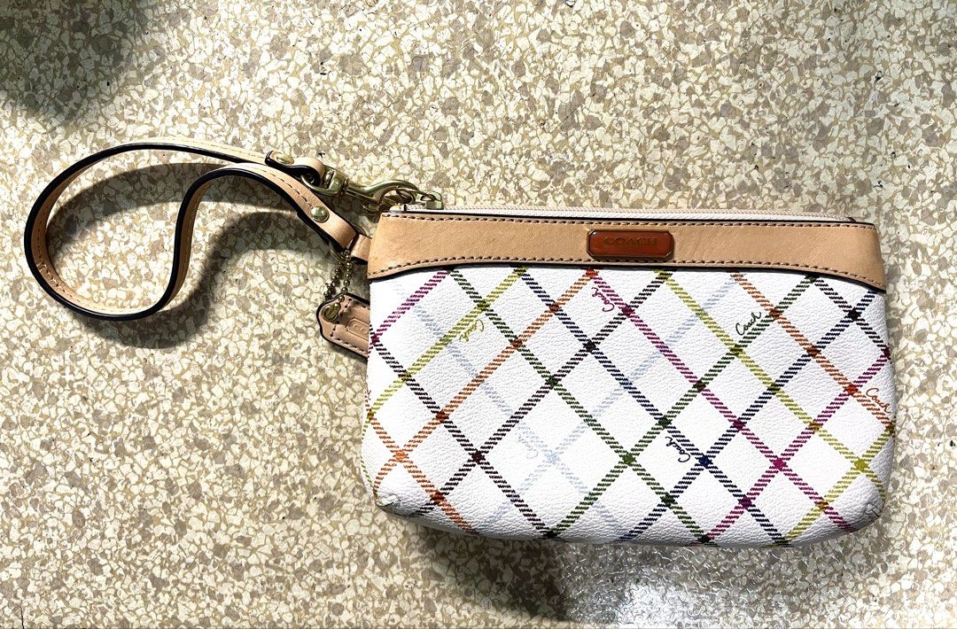 Coach Peyton Tattersall Wristlet (Category: Clutches) located in Valenzuela. Submitted by 1uvcherrymotion (Listing ID 1464460237, Image 1). Description: — barely used — has minor stains at the back due to age payment: maya & bank transfer delivery: jnt & lalamove.