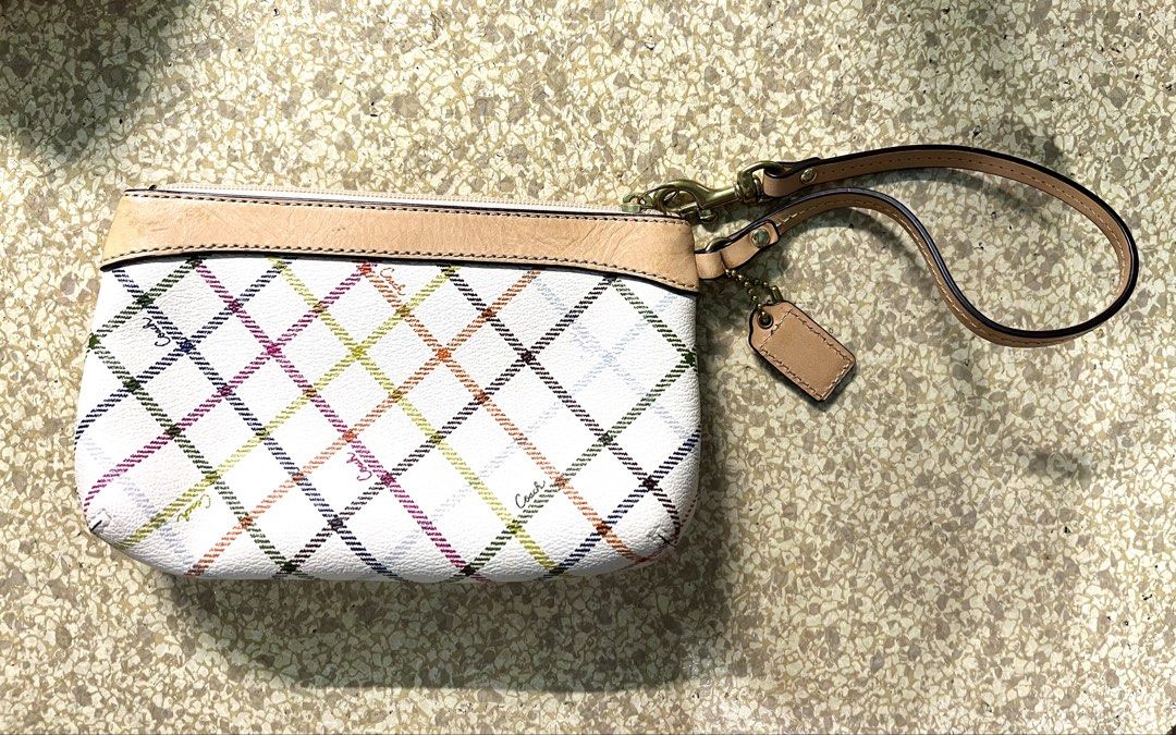 Coach Peyton Tattersall Wristlet (Category: Clutches) located in Valenzuela. Submitted by 1uvcherrymotion (Listing ID 1464460237, Image 2). Description: — barely used — has minor stains at the back due to age payment: maya & bank transfer delivery: jnt & lalamove.