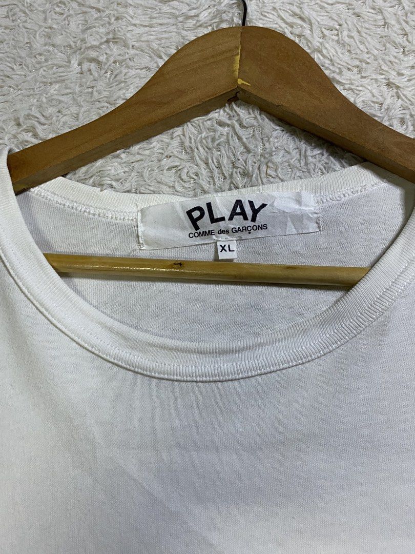 Comme des Garcons (play) (Category: Tshirts & Polo Shirts ) located in Cavite. Submitted by nld_thrift (Listing ID 1464361523, Image 3). Description: Comme des Garcons (play) W: 21Inc L: 27.5 Inc XL ON TAG Made In JAPAN 100% Cotton No refund/ no return, ask before buy, all sales are final. IF YOU ARE IN DOUBT ABOUT ANY DETAILS OF THE ITEM YOU’RE PURCHASING PLEASE FEEL FREE TO CONTACT US .
