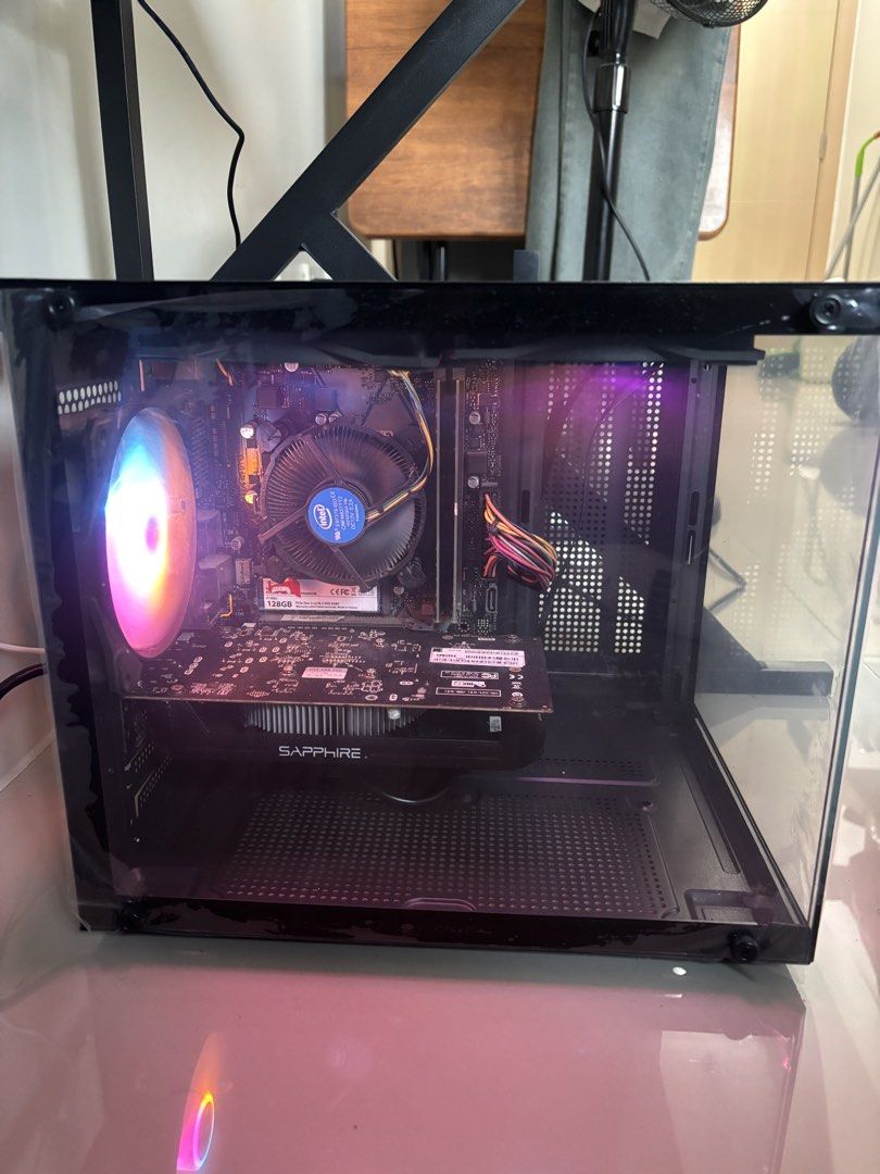 Computer set (Category: Desktops) located in Quezon City. Submitted by brightshark_5b5656 (Listing ID 1464464684, Image 3). Description: 🔥Processor: i3 9100 🔥Motherboard: h310 mobo 🔥RAM: 8gb ram ddr4 🔥SSD stoarage: 128gb ssd m.2 🔥GPU: rx550 2gb ddr5 🔥Brand new case: mma panoramic view with 3rgb fans.