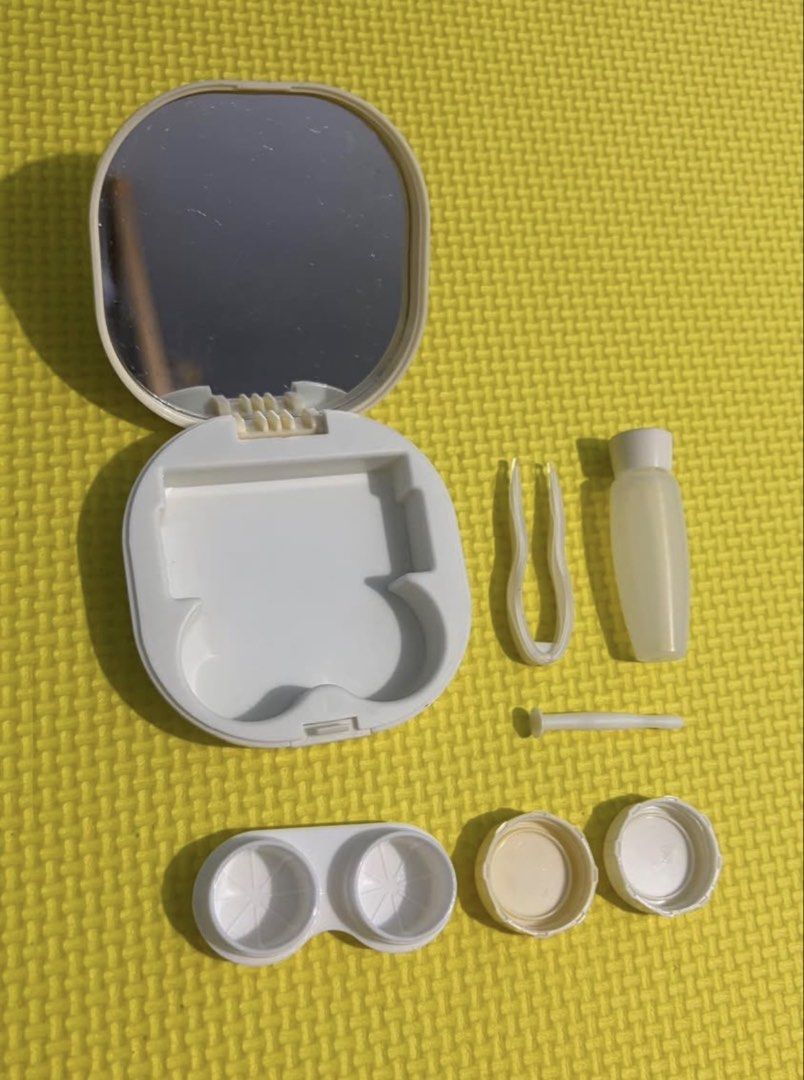 Contact Lens Kit with Mirror (Category: Vision Care) located in Navotas City. Submitted by iceee21 (Listing ID 1464382973, Image 2). Description: Contact Lens Kit with Mirror. Includes tweezers, solution bottle, lens holder. Built-in mirror. Compact and portable. White plastic..