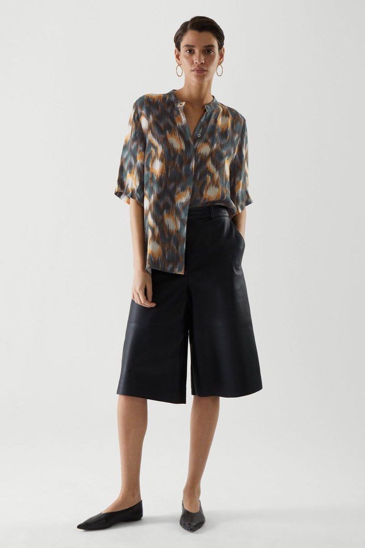 COS BRAND SHORT SLEEVE (Category: Blouses) located in Santa Rosa. Submitted by eceldg05 (Listing ID 1464407219, Image 1). Description: COS BRAND SHORT SLEEVE TOP BUTTON DOWN MED/large fit Flowy satin fabric Like new.